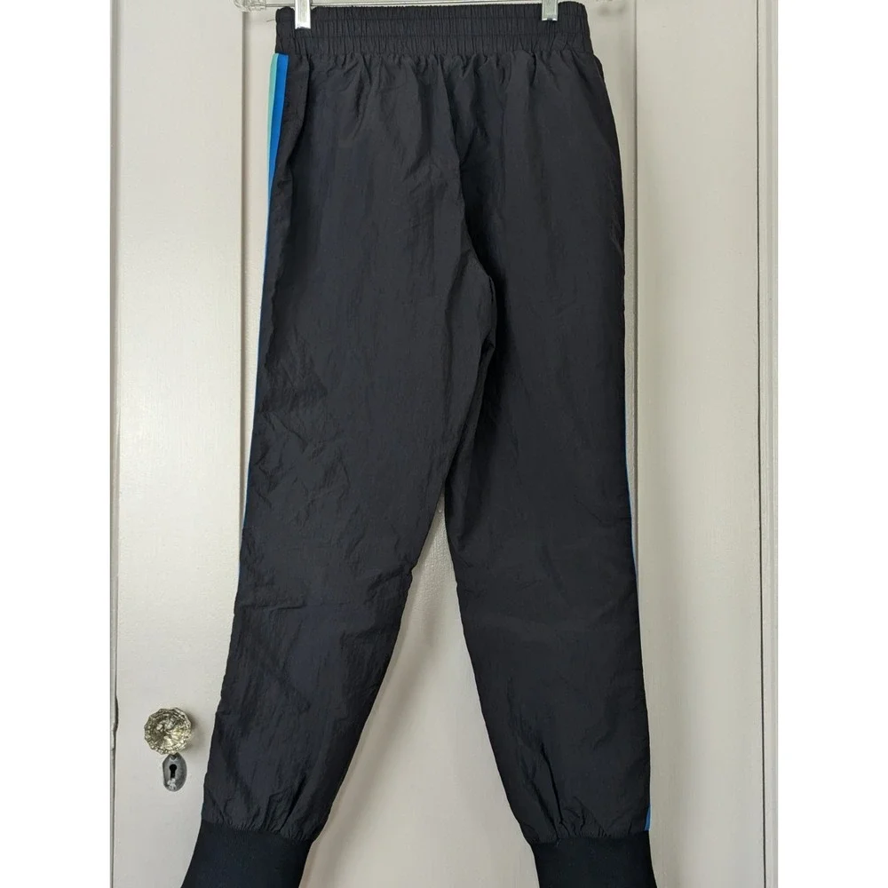 Fabletics Windbreaker Pants Womens S Black Rainbow Side Stripe Zip Ankle Track - Picture 6 of 7